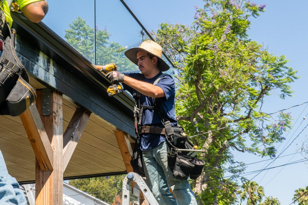 The Brothers That Just Do Gutters crew on a Los Angeles job