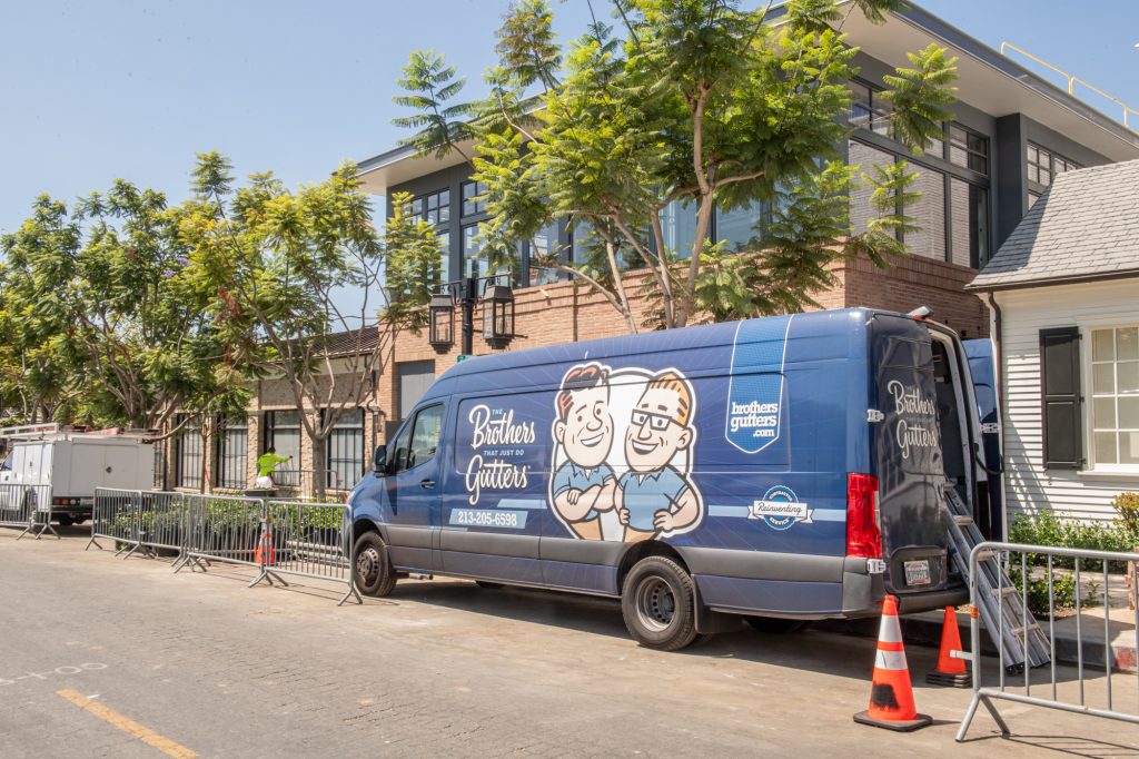 The Brothers That Just Do Gutters van on a tree-lined street