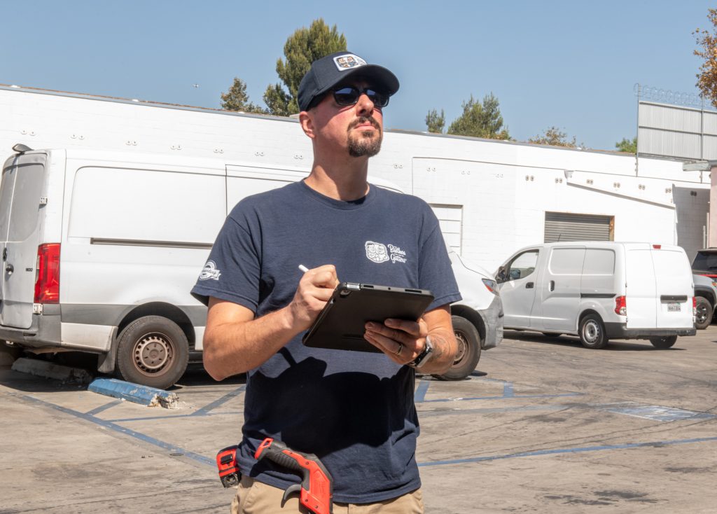 Walking the job with a clipboard before the crew starts