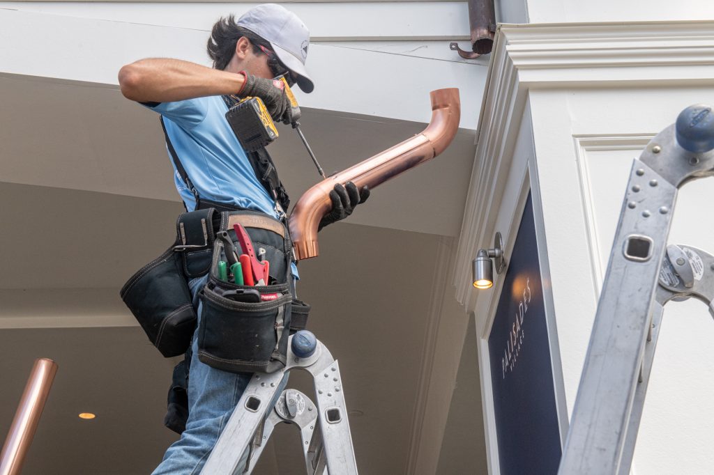 The Brothers That Just Do Gutters crew on a Los Angeles job