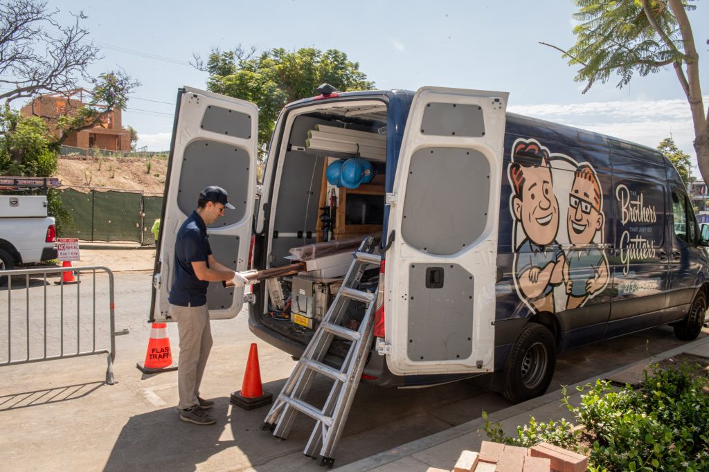 The Brothers That Just Do Gutters crew on a Los Angeles job