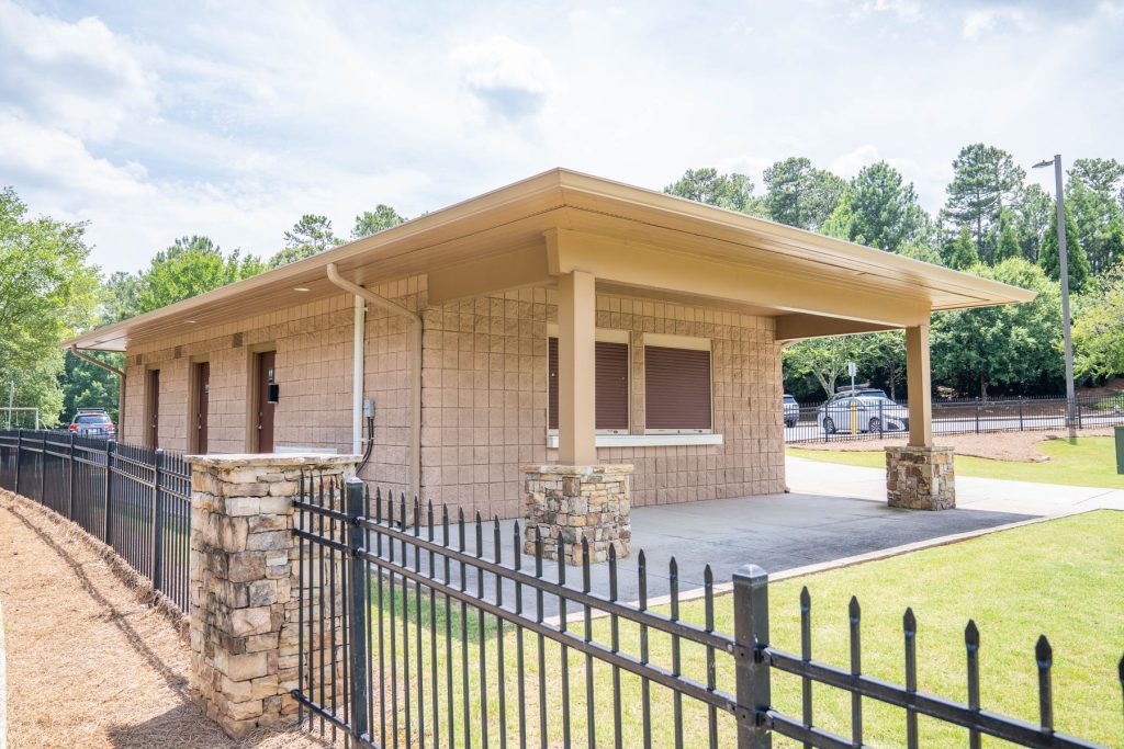 Gutters and a downspout on a covered stone pavilion
